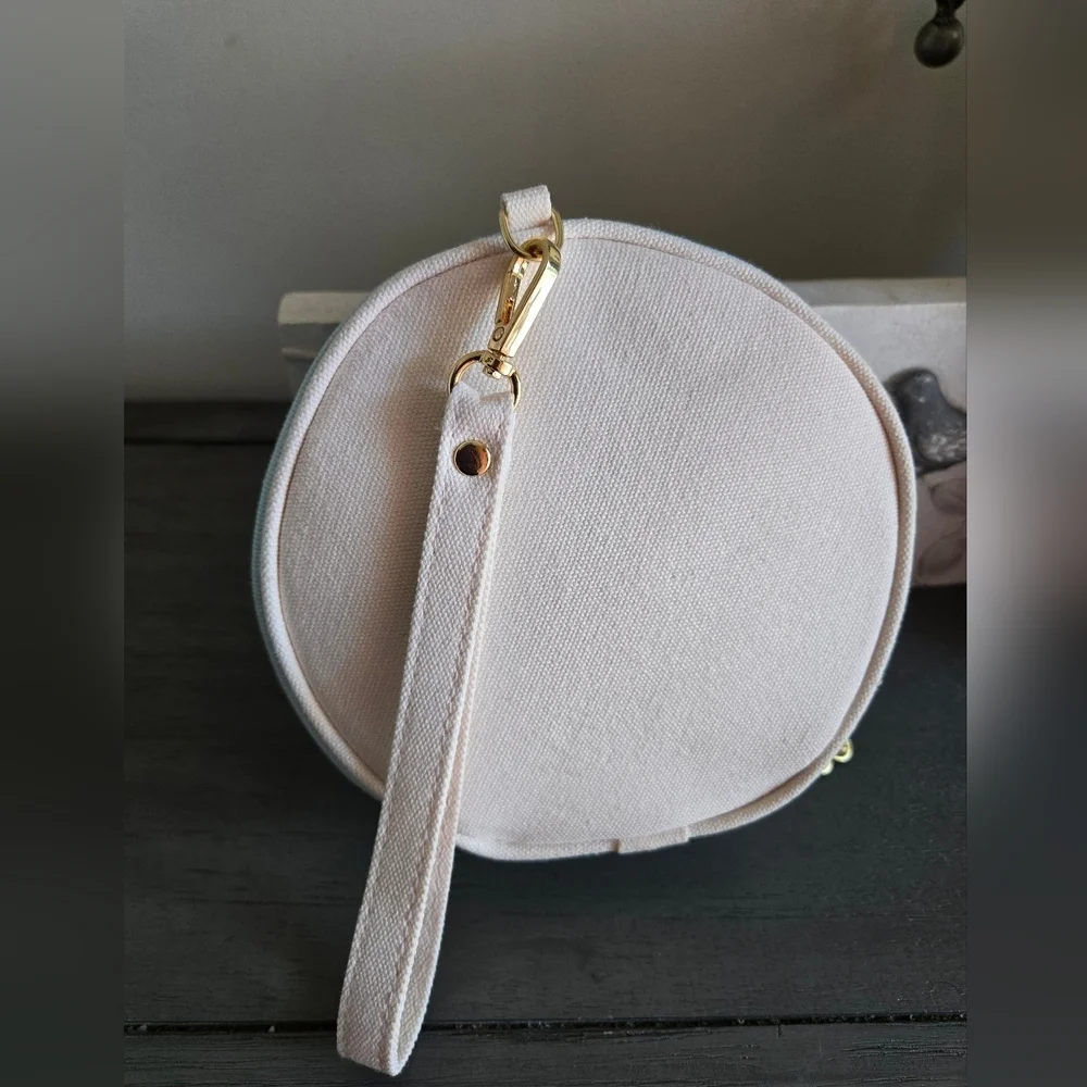 Marc Jacobs Cream Round Cosmetic Bag with Cherry Charm